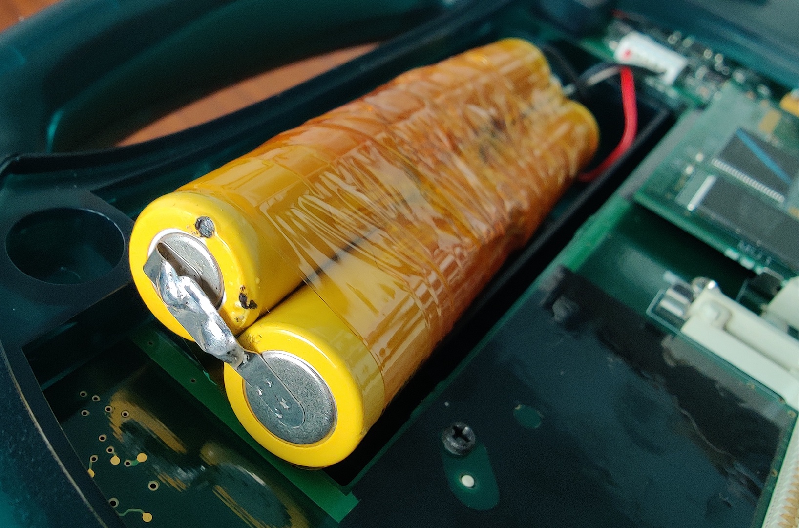 the bottom of a battery pack, showing two cells soldered together